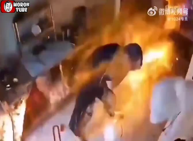 Video :A man in China was engulfed in flames following a gas explosion